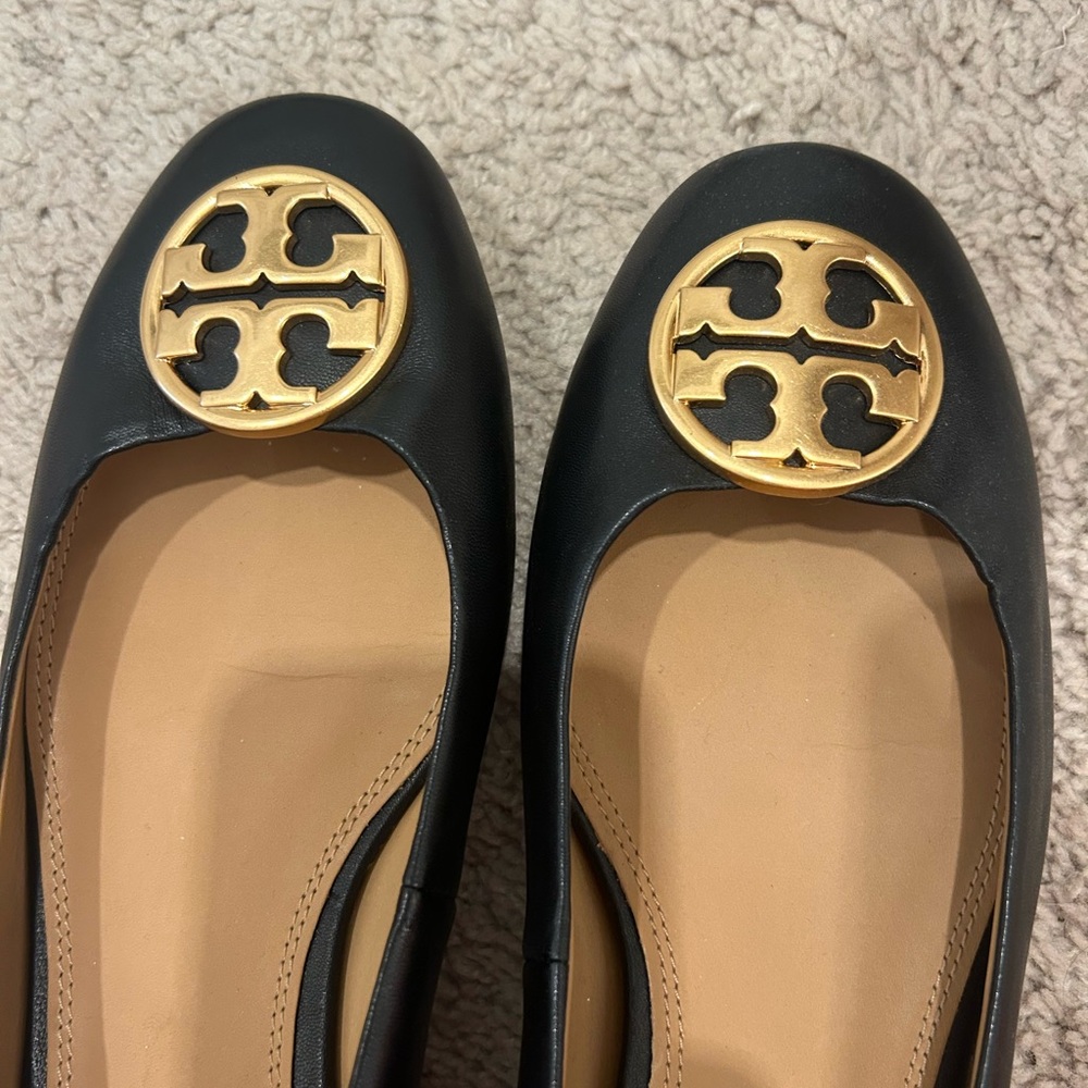 Tory Burch Black and Gold Flats with Signature Medallion